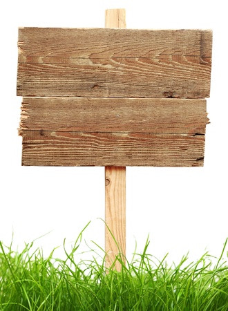road sign with green grass isolated on a white background の写真素材