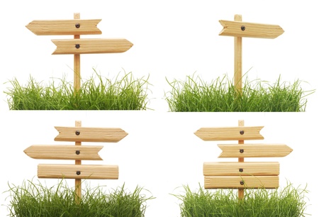set road signs with green grass isolated on a white background の写真素材