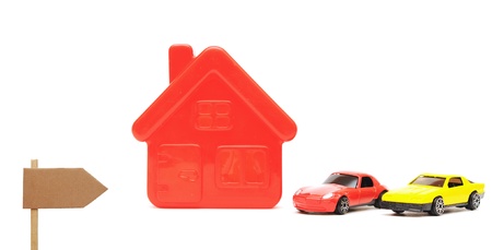 a house and car toy isolated on whiteの写真素材