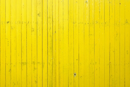 Close up of yellow wooden fence panels. It is possible to use as a background. の写真素材