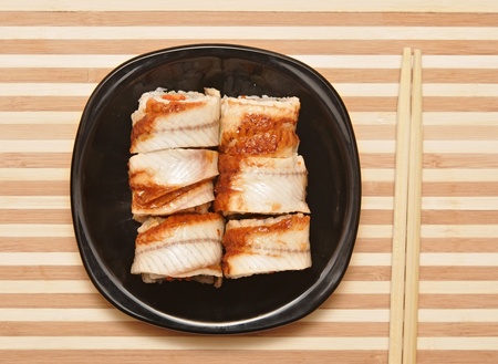 Seafood. Traditional sushi and rolls on the dishの写真素材