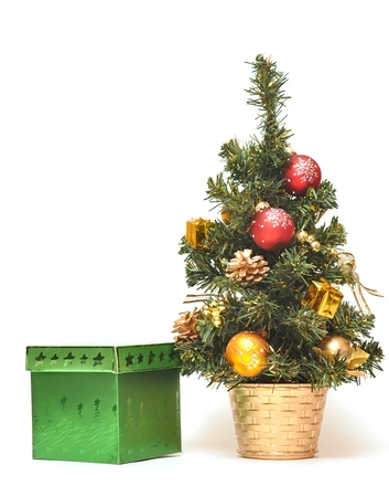 gift box and christmas tree with decorationsの写真素材