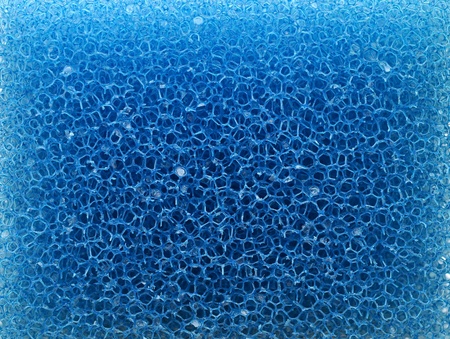 Close-up of blue cleaning sponge. Background or texture の写真素材