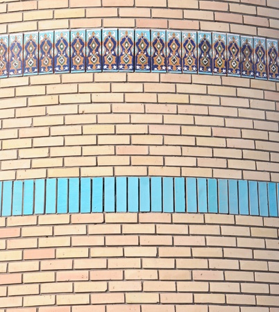 brick wall with color mosaicの写真素材