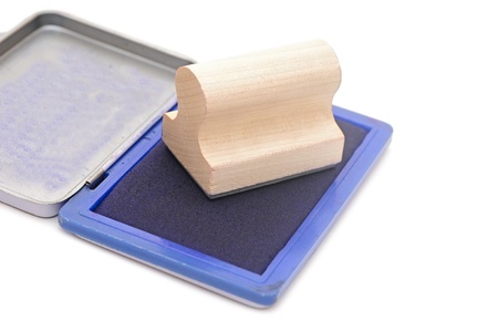 closeup rubber stamp with stamp pad on white backgroundの写真素材