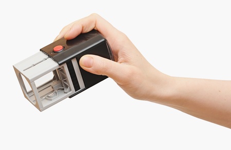 Hand with stamp for documents on white backgroundの写真素材