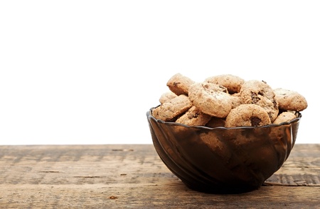 chocolate chip cookies in a cup on wooden tableの写真素材