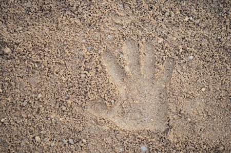 hand prints on the sand Ð¼の写真素材