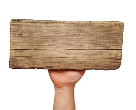 Wooden board sign on hand isolate on white の写真素材