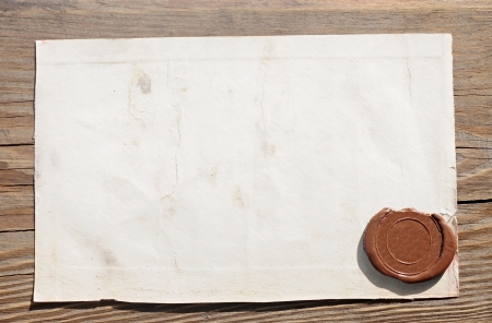 Old paper on the wood background の写真素材