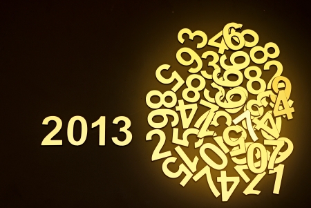 digit 2013 and pile random numbers on black backgroundの写真素材