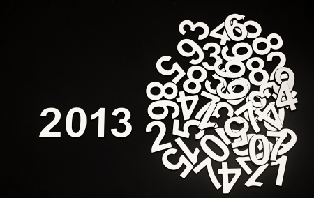 digit 2013 and pile random numbers on black backgroundの写真素材