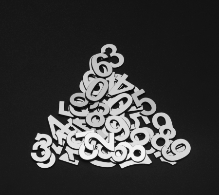 pyramid of random numbers on black background
