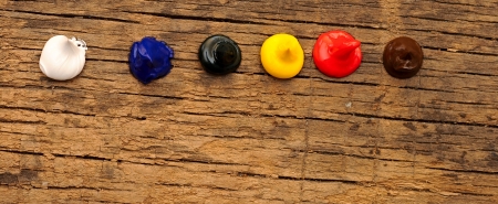  colorful paint over old wood tableの写真素材