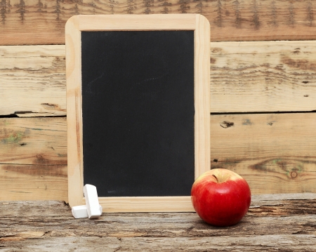 red apple on chalkboard, add text to chalkboardの写真素材