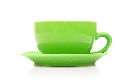 An empty green cup isolated on whiteの写真素材