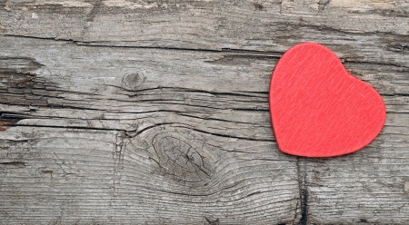 red heart on wood with copy space の写真素材