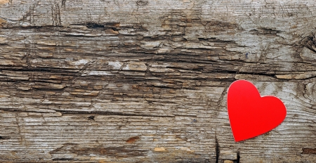 red heart on wood with copy space の写真素材