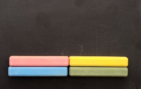 close up of blackboard and color chalksの写真素材