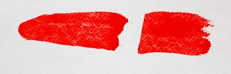red stroke of the paint brush isolated on whiteの写真素材