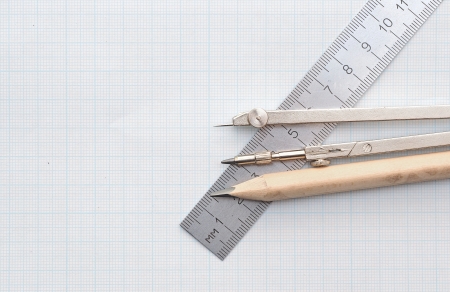 Geometry set with compass,pencil,ruler on graph paper