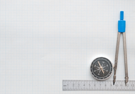 compass and pencil on graph paperの写真素材
