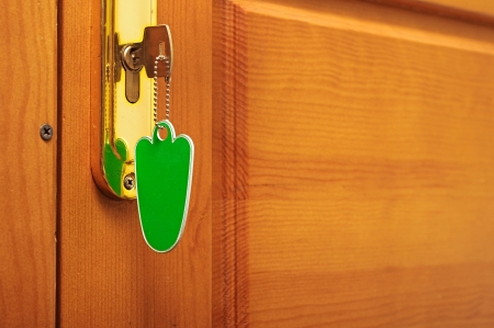 key in keyhole with blank labelの写真素材
