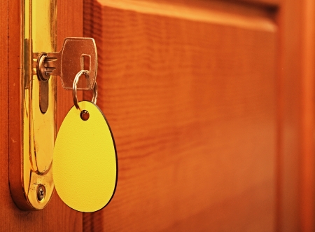 key in keyhole with blank labelの写真素材