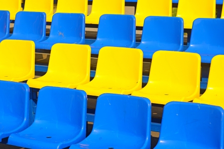 Empty plastic seats in a stadium の写真素材