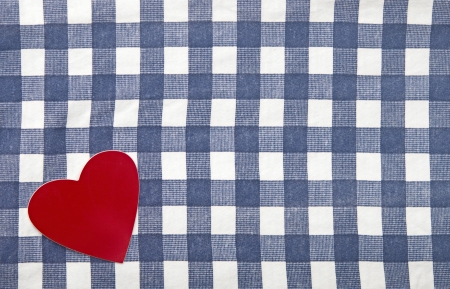 red heart shape on checkered textile の写真素材