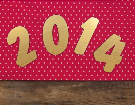 2014 new year on red polka dot の写真素材