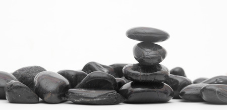balancing stones isolated on a white