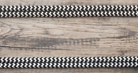 frame of rope on a old wooden background 
