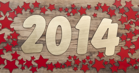 stars background and golden number 2014 on a old wooden background. Happy New Year