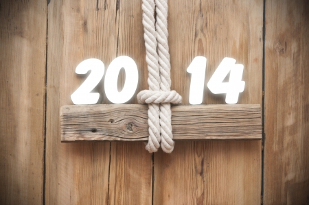 text 2014 on old wood background の写真素材
