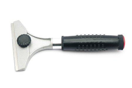 Wallpaper scraper with black handle isolated on white の写真素材