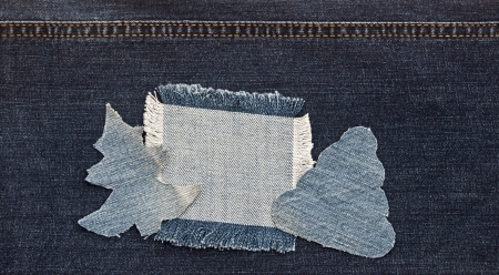 christmas background: jeans texture with shape Christmas tree. 