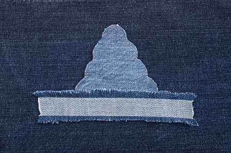 christmas background: jeans texture with shape Christmas tree. 