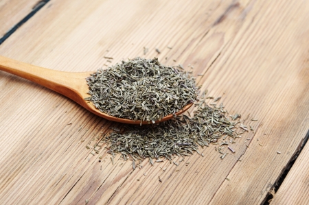 Thyme in wooden spoon の写真素材