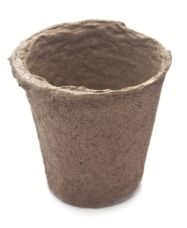 pile peat pots for growing seedlings, isolated on white background の写真素材