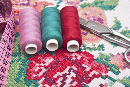 Cross-stitch set  colorful threads and canvas 