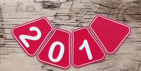 wooden background with red labels that shown detail of the texture background and wording 201 and...