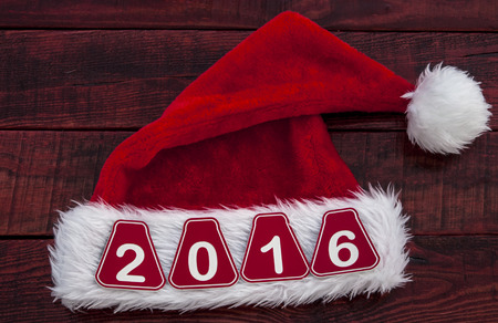 Santa hat on wooden table