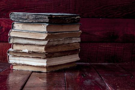 Pile old books on the tabletop.の写真素材