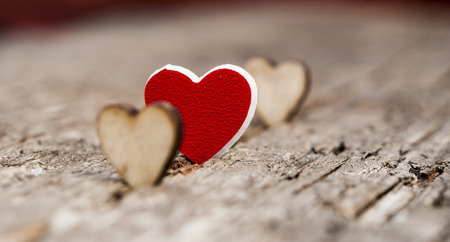 Valentine day. Hearts on a background of wood. Space for text.の写真素材