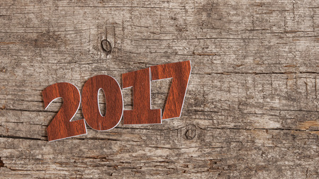 Happy new year 2017 on wood backgroundの写真素材