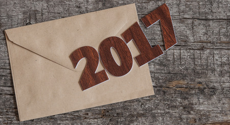 Happy new year 2017 on wood backgroundの写真素材