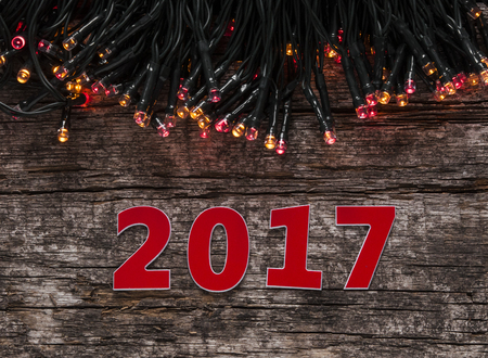 Happy new year 2017 on wood backgroundの写真素材