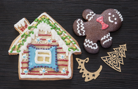 Christmas homemade gingerbread cookies on wooden table