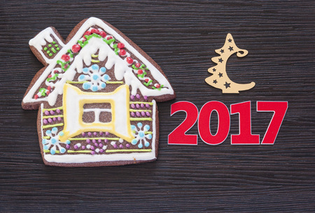 Christmas homemade gingerbread cookies on wooden table